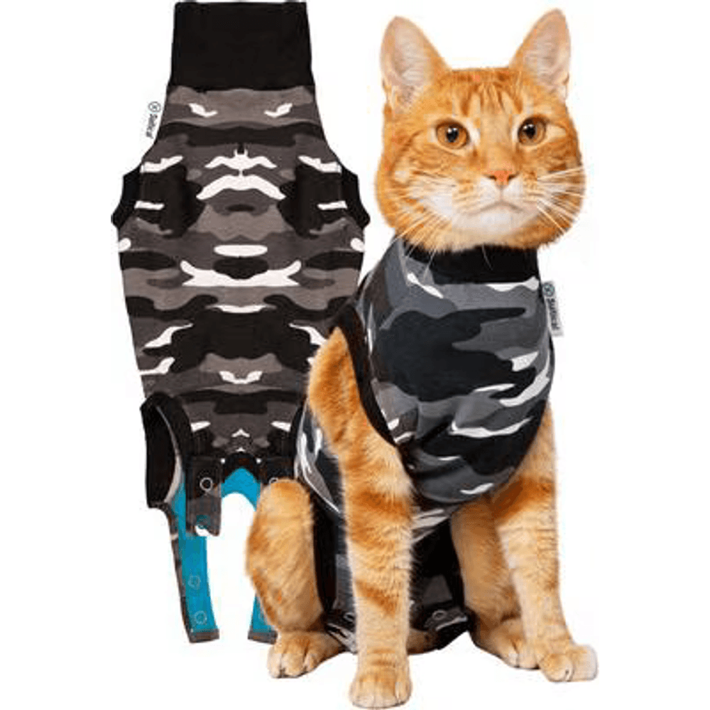 Suitical black camo full-body recovery suit on a ginger cat, covering the abdomen after surgery