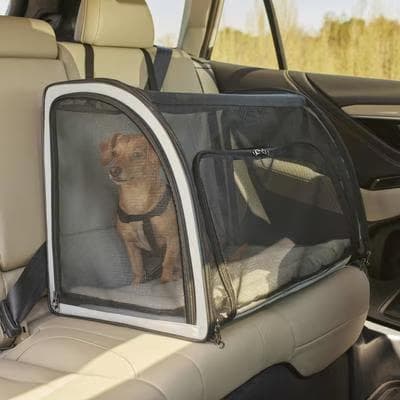Frisco soft-sided travel safety pet carrier with mesh panels secured on a car seat