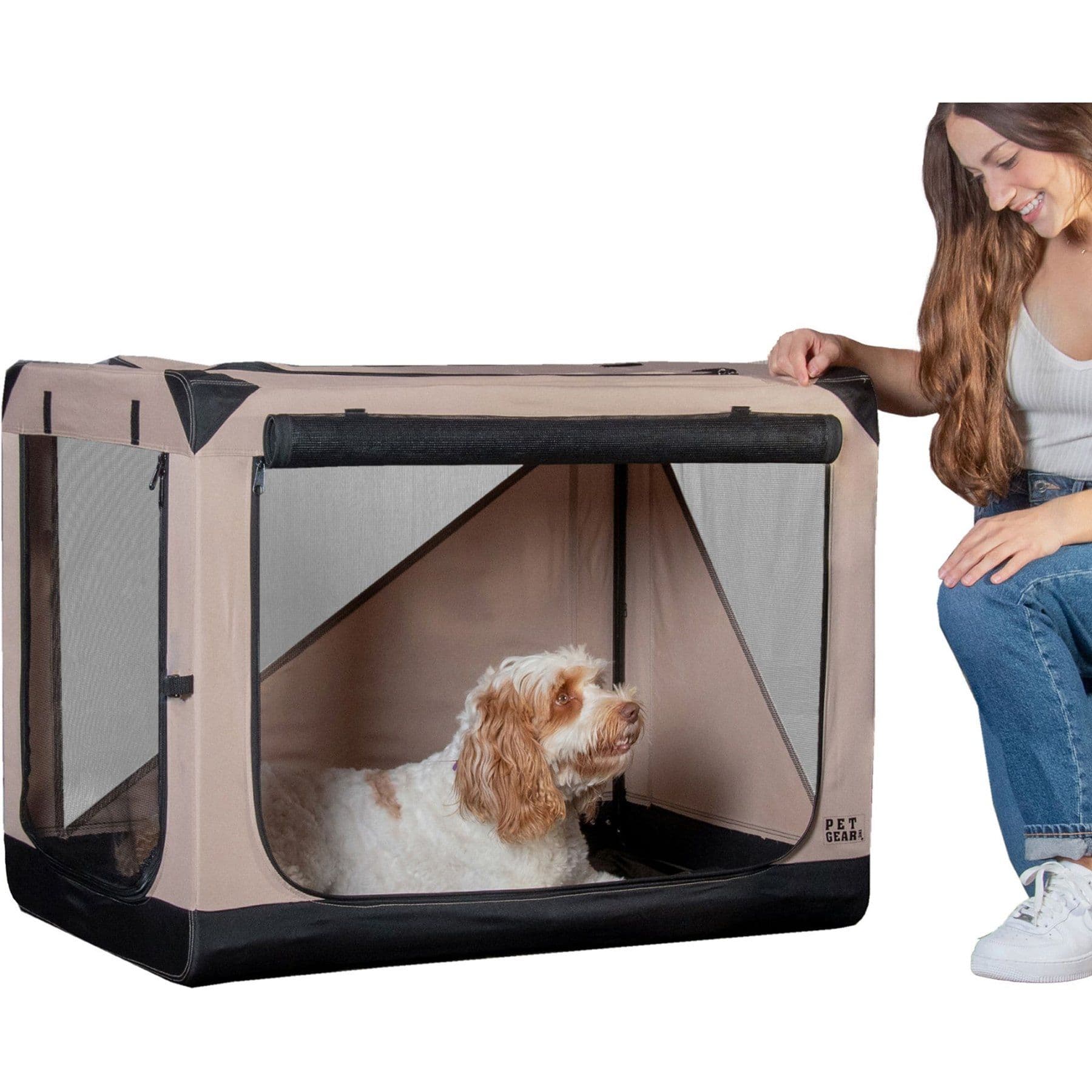 Pet Gear Insta-Fold soft-sided crate with a dog inside and a person beside it